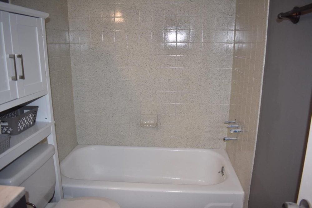 Full wall tile refinishing — after refinishing, Fayetteville, NC