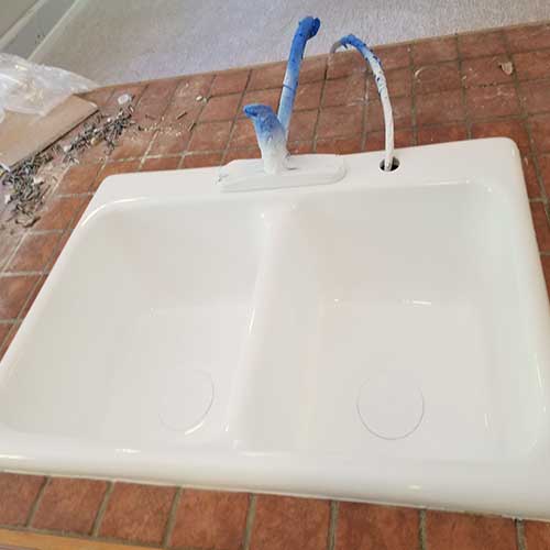 Cast iron sink restoration — after refinishing, Raleigh, NC
