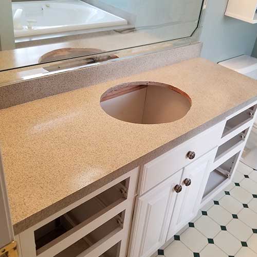Cultured marble vanity — after refinishing, Cary, NC